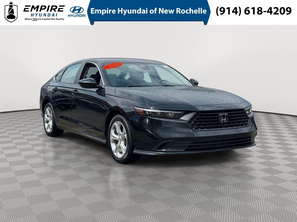 2024 Honda Accord LX in Radiant Red Metallic — front three-quarter view