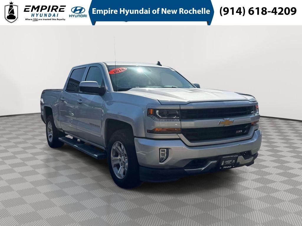 2018 Chevrolet Silverado 1500 2LT in Silver Ice Metallic — front three-quarter view