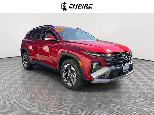 2025 Hyundai Tucson SEL Convenience in Ultimate Red — front three-quarter view