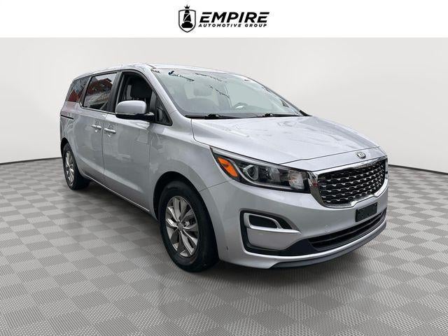 2020 Kia Sedona LX in Silky Silver — front three-quarter view