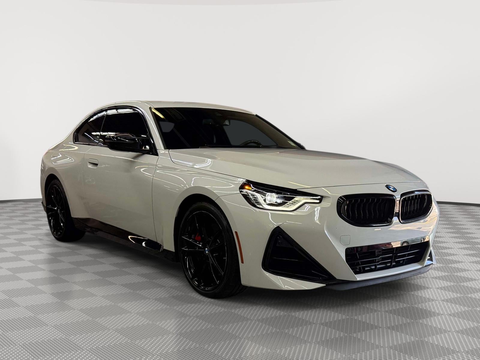 2024 BMW 2 Series M240i xDrive in Alpine White — front three-quarter view