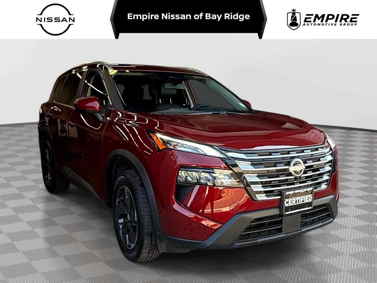 2026 Nissan Rogue SV in Scarlet Ember Tintcoat — front three-quarter view