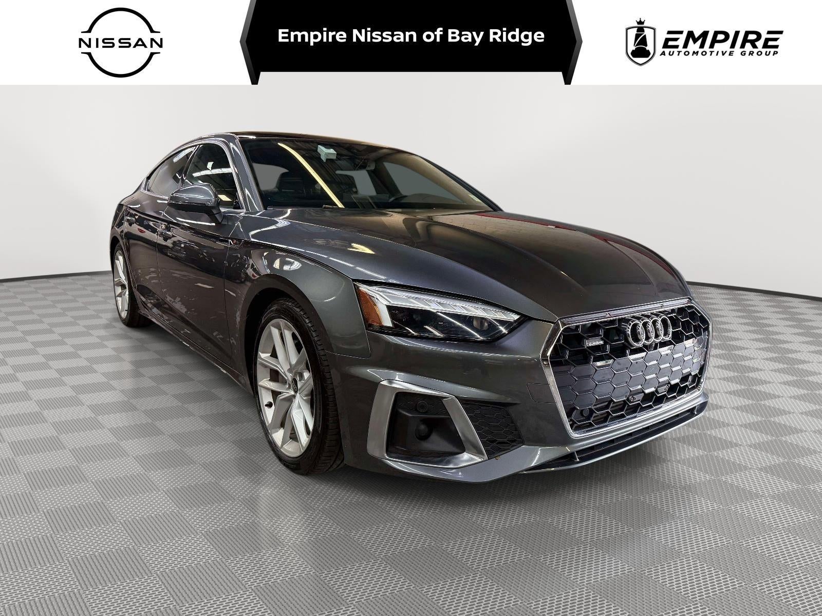 2024 Audi A5 Sportback Premium Plus 45 TFSI quattro S tronic in White — front three-quarter view