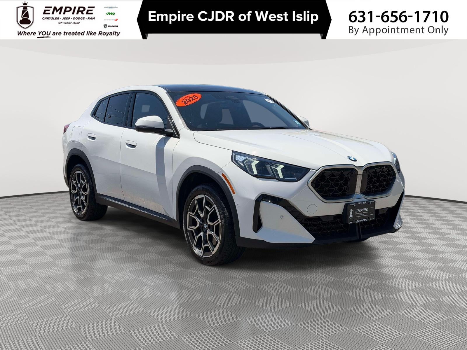 2025 BMW X2 xDrive28i in Alpine White — front three-quarter view