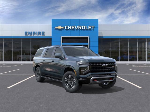 2026 Chevrolet Suburban Z71 in Cypress Gray — front three-quarter view