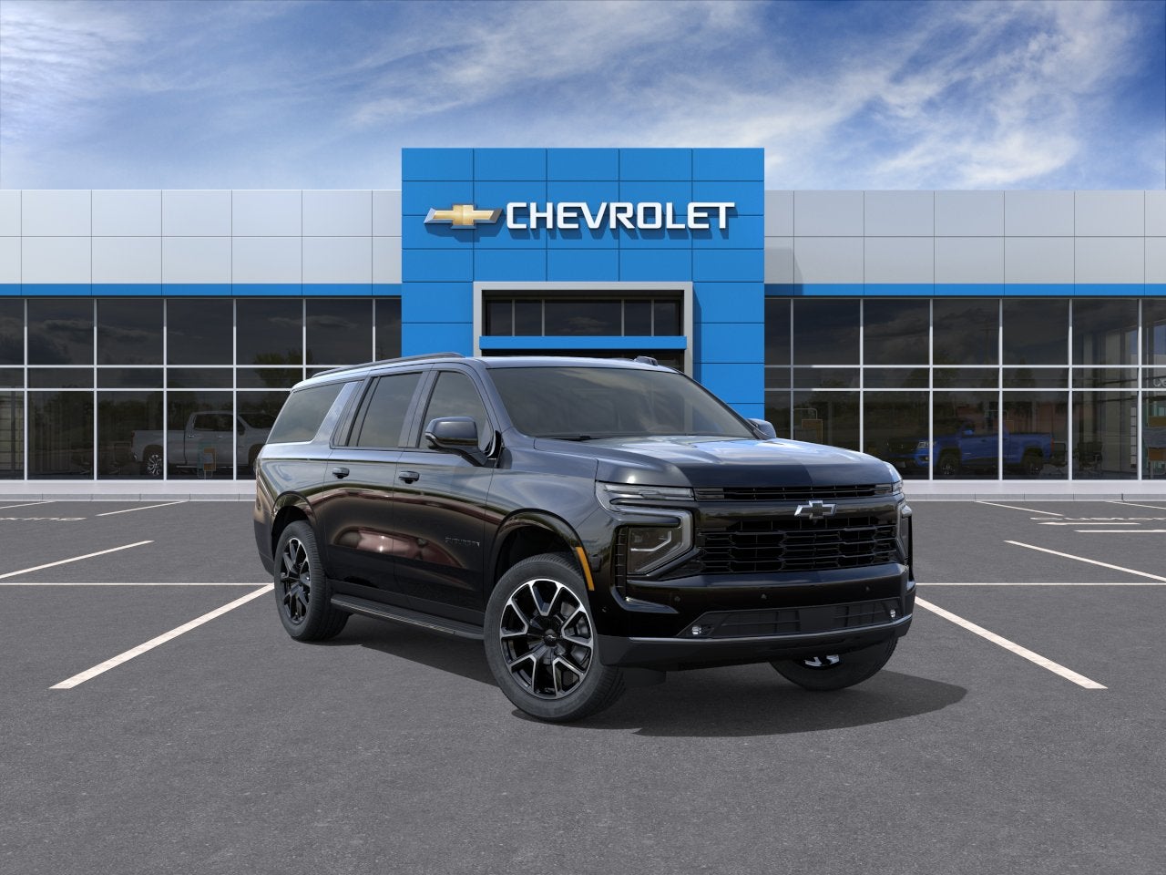 2026 Chevrolet Suburban RST in Black — front three-quarter view