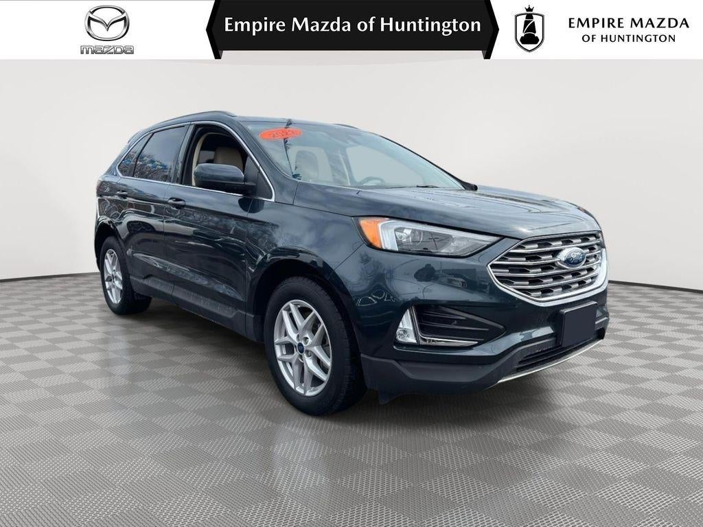 2022 Ford Edge SEL in Stone Blue Metallic — front three-quarter view