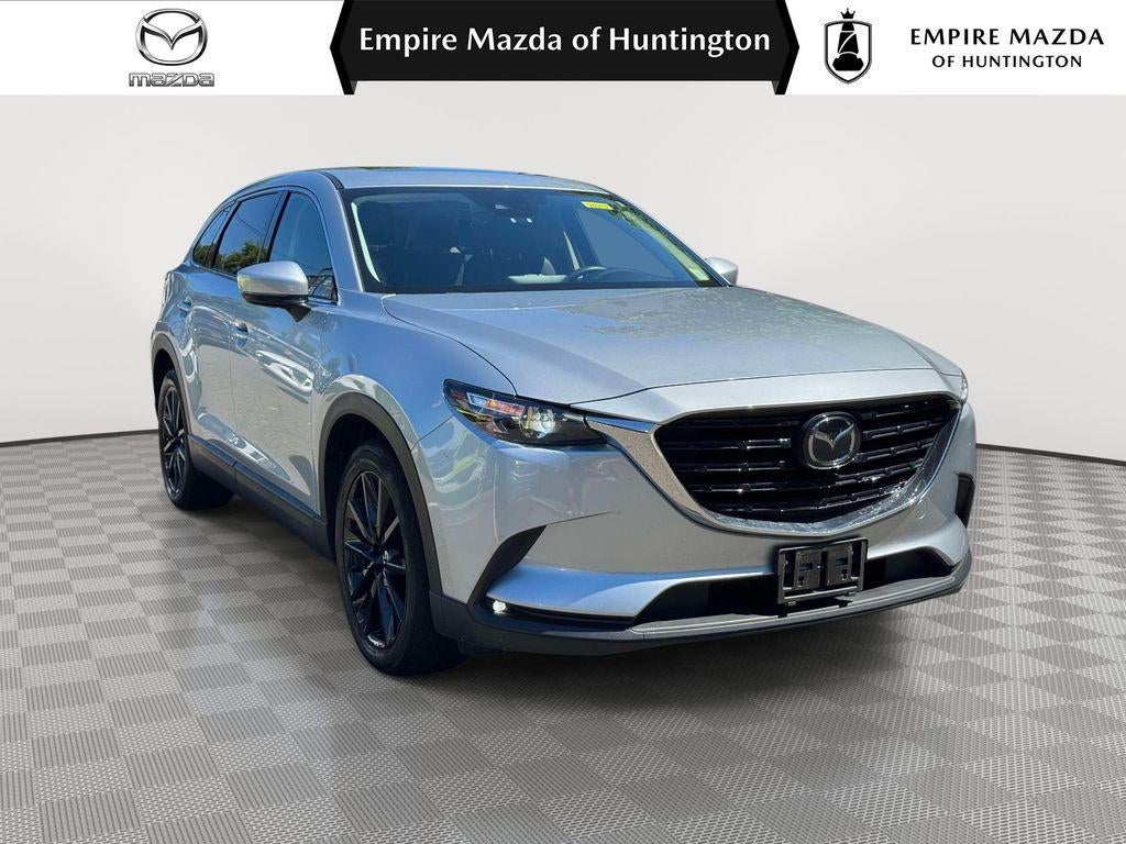 2023 Mazda Mazda CX-9 Touring Plus in Sonic Silver Metallic — front three-quarter view