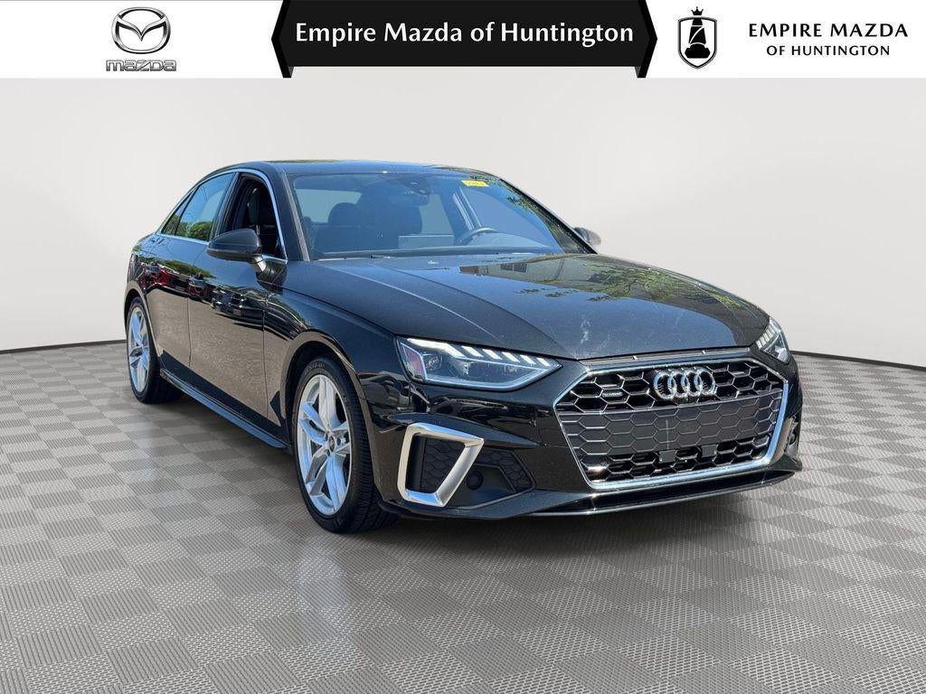 2024 Audi A4 Premium Plus 45 TFSI S line quattro S tronic in White — front three-quarter view